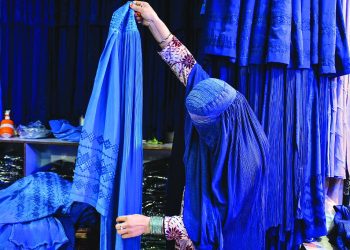 the blue burqa has become a symbol of taliban oppression photo afp