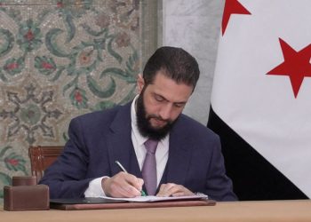 Syria’s al-Sharaa signs temporary constitution