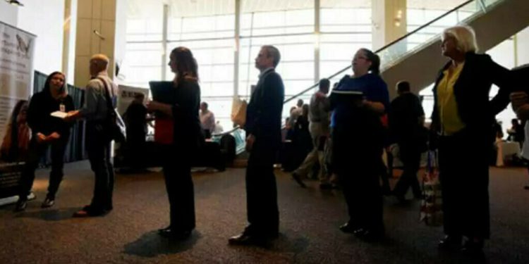 US job growth picks up in February; unemployment rate rises to 4.1%