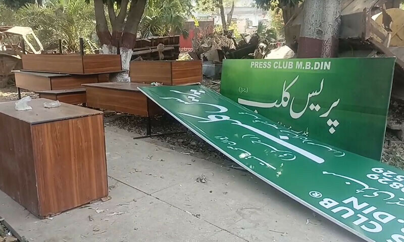 Furniture and other items belonging to the Mandi Bahauddin Press Club lie outside the building on April 6. — Screenshot by author