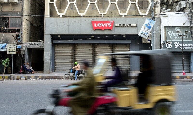  A shutter-down strike observed by traders in Karachi’s Zainab Market on Monday. — Syed Tahir Jamal/White Star 
