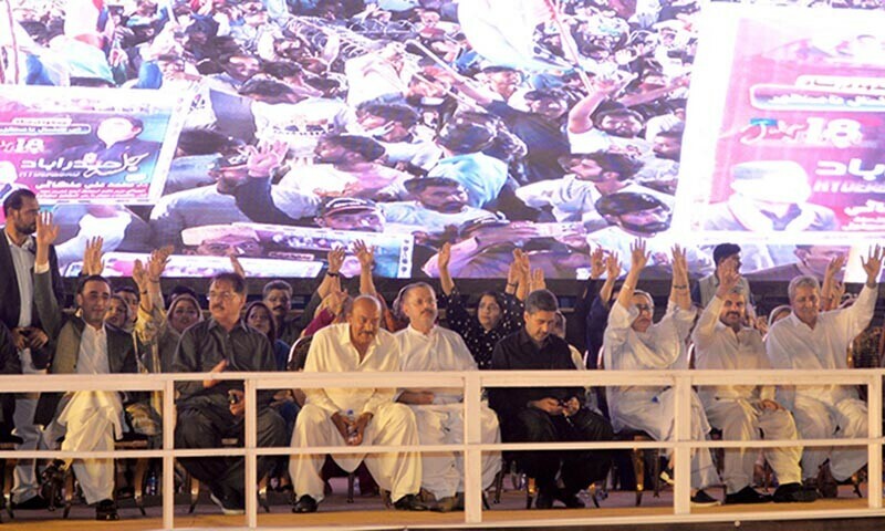  Senior PPP members sit on the stage at a party rally in Hyderabad on April 18. — Umair Ali 