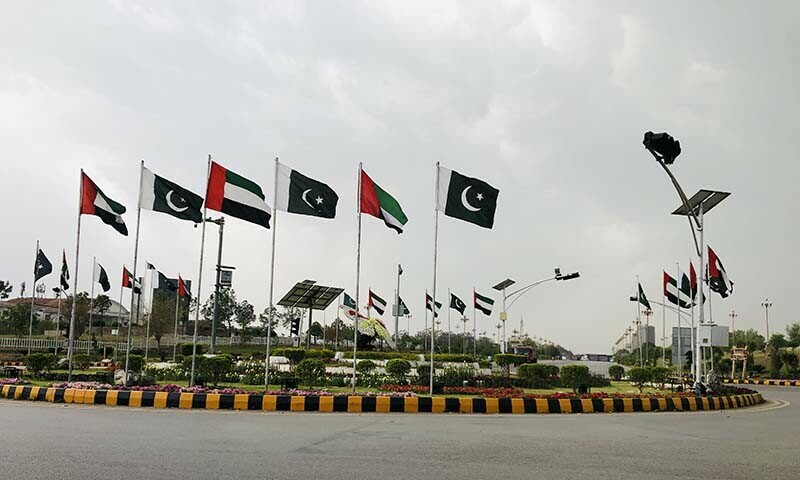  Pakistani and Palestinian flags are hoisted at D-Chowk in Islamabad amid the Jamaat-i-Islami’s ‘Palestine Solidarity March’ on April 20. — Umar Bacha 