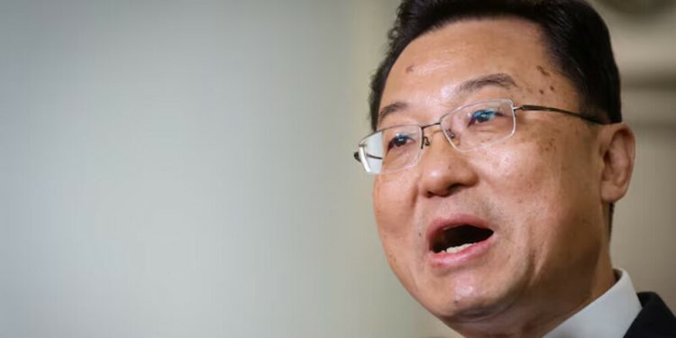 China’s US envoy urges end to trade war, but warns Beijing ready to fight