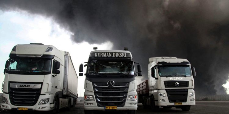 Fires continue to burn as Iran probes deadly explosion at key port