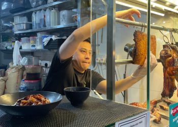 He won a $1 million lottery, then quit his cushy insurance job to open a Cantonese barbequed pork stall. Trading a corporate office for a hot kitchen was harder than he thought.