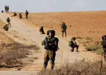 Israel’s defence minister says troops seizing ‘large areas’ in Gaza, expanding buffer zones