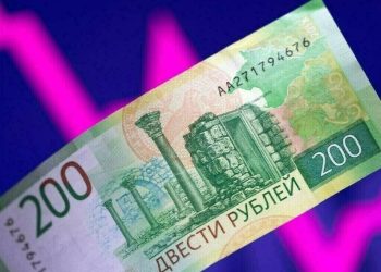 Russian rouble little changed amid global forex turbulence