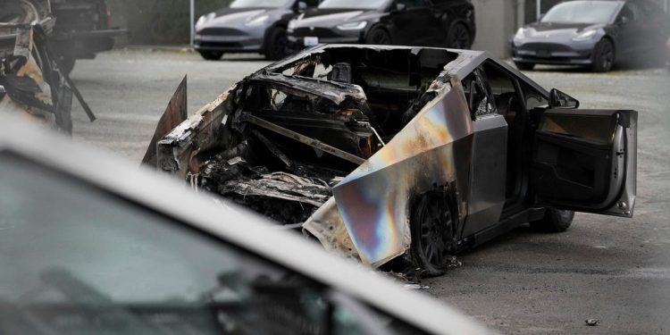 The Justice Department has charged a 19-year-old for 'firebombing' Cybertrucks at a Tesla dealership