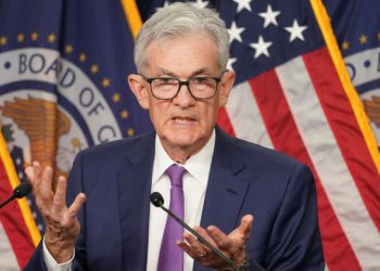 Fed leaves rates unchanged, cites rising risk of higher inflation and unemployment