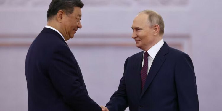 Putin greets China’s Xi at Kremlin