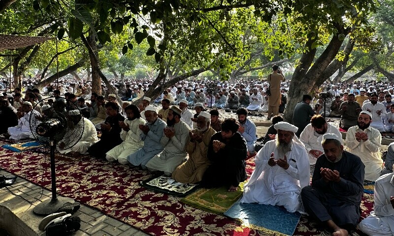  People offer Eidul Azha prayers at an Eidgah at Charsadda Road, Peshawar, June 7. — Zahid Imdad 
