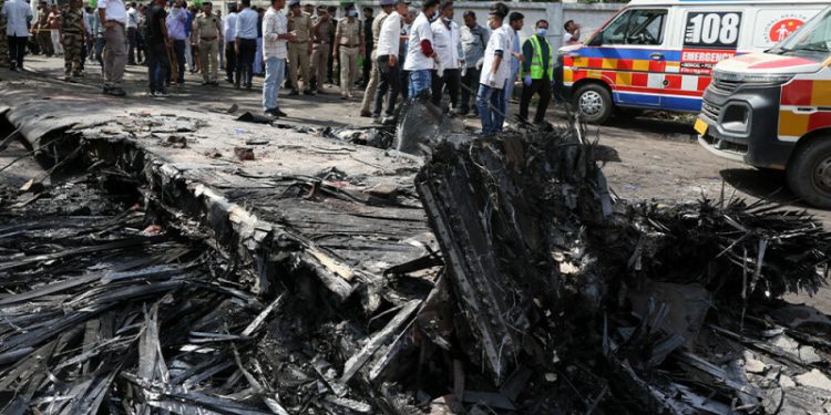 ‘Many killed’ as Air India plane with 242 on board crashes near India’s Ahmedabad airport