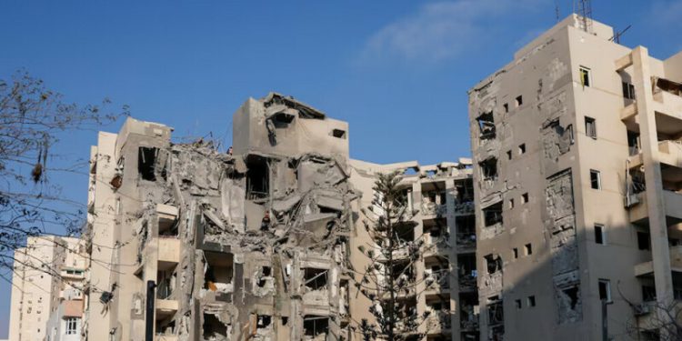 Israel reports waves of Iranian missiles, soon after Trump announced ceasefire