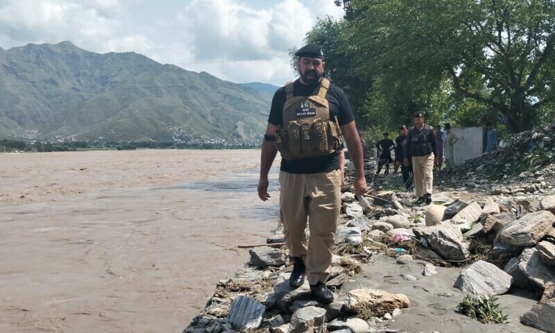 Police participate in rescue operations, Swat, June 27. — Swat Police