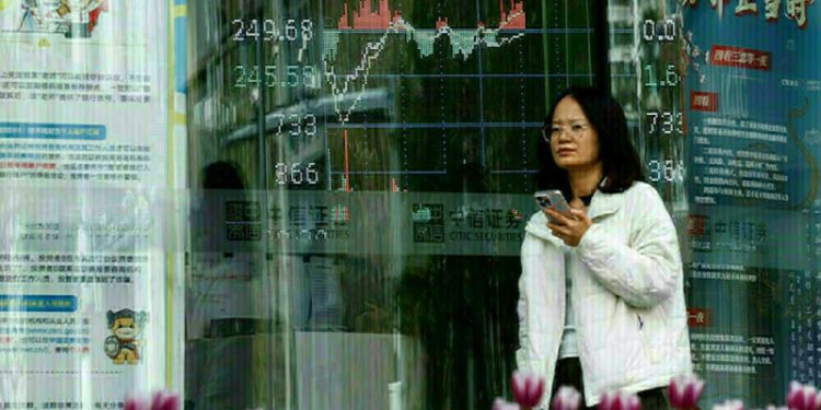 Asian stocks up, dollar soft as trade uncertainty mounts