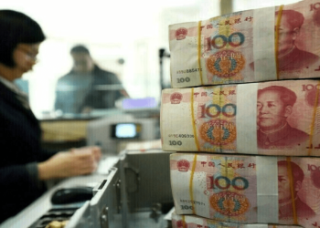 China’s yuan holds firm as traders await US-China talks