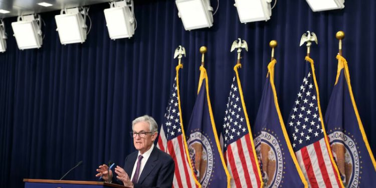 Fed keeps rates unchanged, sees two cuts in 2025 but less easing in later years