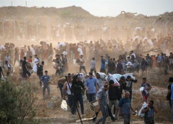 Gaza civil defence says 15 killed near aid centre, army says fired ‘warning shots’