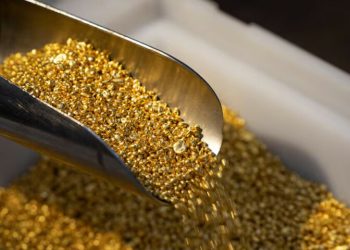 Gold falls on strong dollar; US-China talks take spotlight