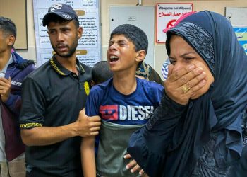 Israeli gunfire, airstrikes kill 60 in Gaza, many near aid site, medics say