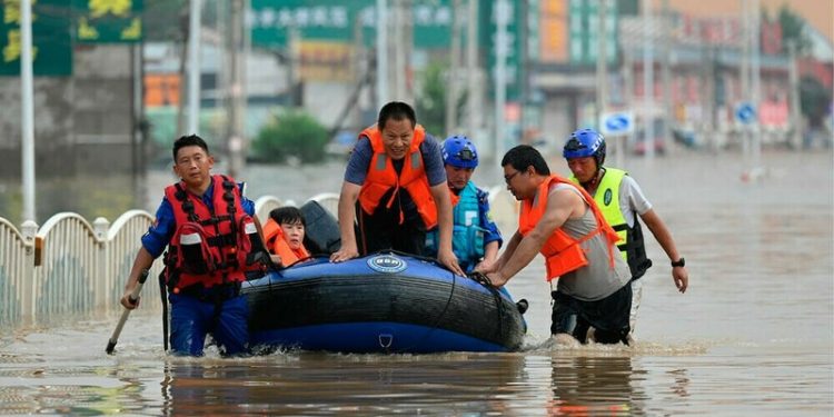 Over 80,000 people flee severe flooding in southwest China