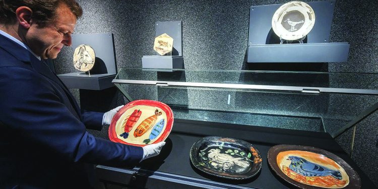 Plates, pastels, and palette of blue