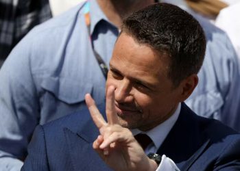 Poland holds knife-edge vote with EU role at stake