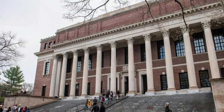 Trump administration ramps up attack on Harvard, Columbia