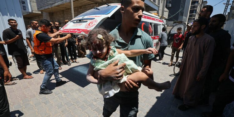 Gaza civil defence says Israeli fire kills 26 near two aid centres