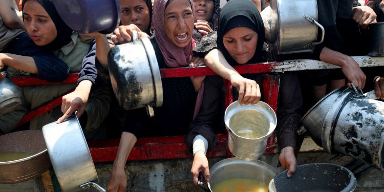 Israeli military begins daily ‘tactical pause’ in parts of starving Gaza