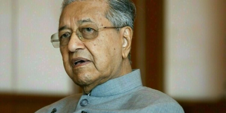 Malaysia ex-PM Mahathir, 100, in hospital for fatigue, office says