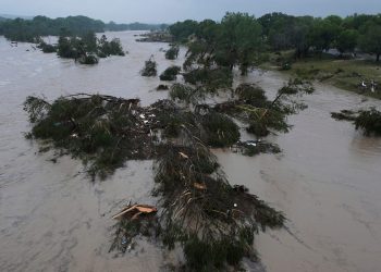 Photos show Texas floods and rescue efforts; one girls' camp said its director is among the dead