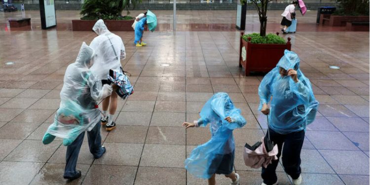 Shanghai grapples with twin threats of tropical cyclone, tsunami