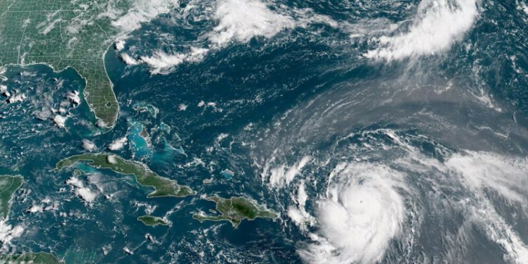 Category 4 hurricane Erin continues to intensify, NHC says