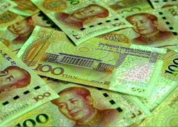 Yuan slips from two-week high as China data disappoints