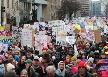 Anti-Trump protesters march through London as president basks in royal welcome