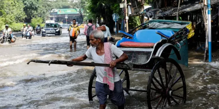 At least 12 dead as record rain floods India’s Kolkata