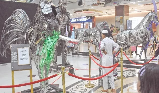 sculptures made of metal scrap on display at a mall in islamabad photo online