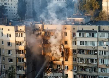 Infant among three killed in Russian attack that sets ablaze seat of Ukraine government