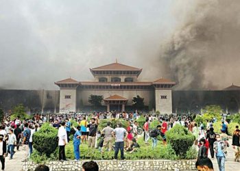 Nepali protesters set parliament ablaze as PM quits