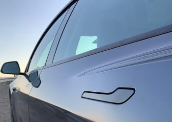 Tesla is redesigning its door handles after some parents reported children getting trapped inside