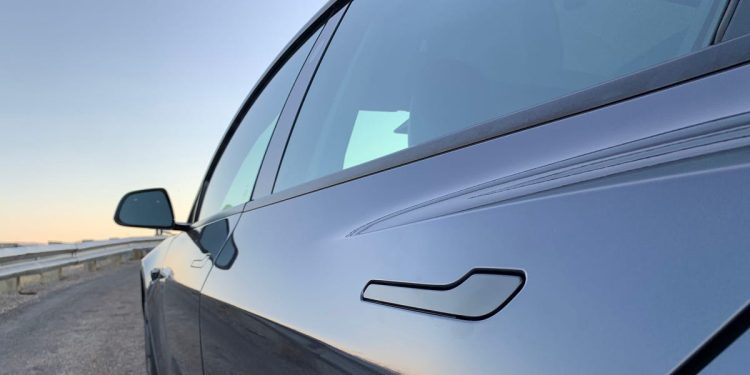 Tesla is redesigning its door handles after some parents reported children getting trapped inside