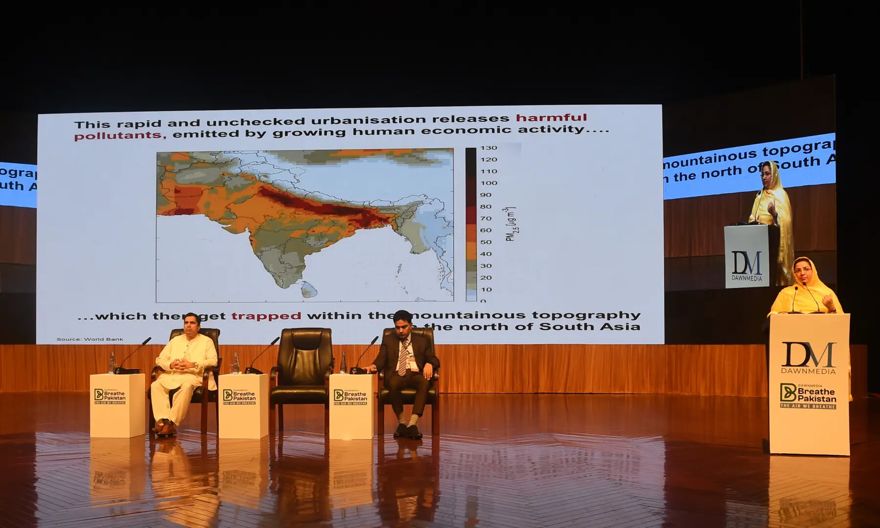  Silwat Saeed, secretary of Punjab’s Environment Protection and Climate Change Department, gives a presentation. Punjab EPA Director General Dr Imran Hamid Sheikh and Tariq Hussain, project director of Punjab Green Development Programme’s Strategic Planning and Implementation Unit, are also present on the stage.  — Murtaza Ali / White Star 