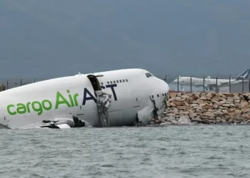 Cargo plane slides off runway in Hong Kong, media reports two dead