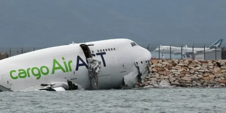 Cargo plane slides off runway in Hong Kong, media reports two dead