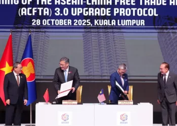 China and ASEAN, hit by US tariffs, sign upgraded free trade pact