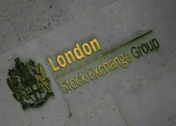 FTSE 100 closes at record high, boosted by financials