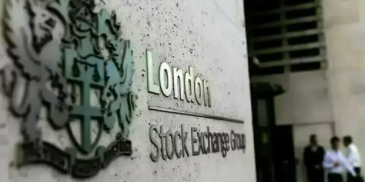 FTSE 100 ends at record high, boosted by oil and earnings