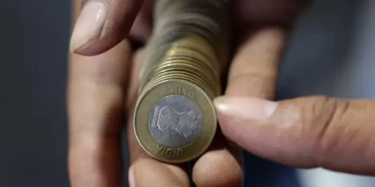 Rupee boxed in by persistent importer hedging, central bank intervention